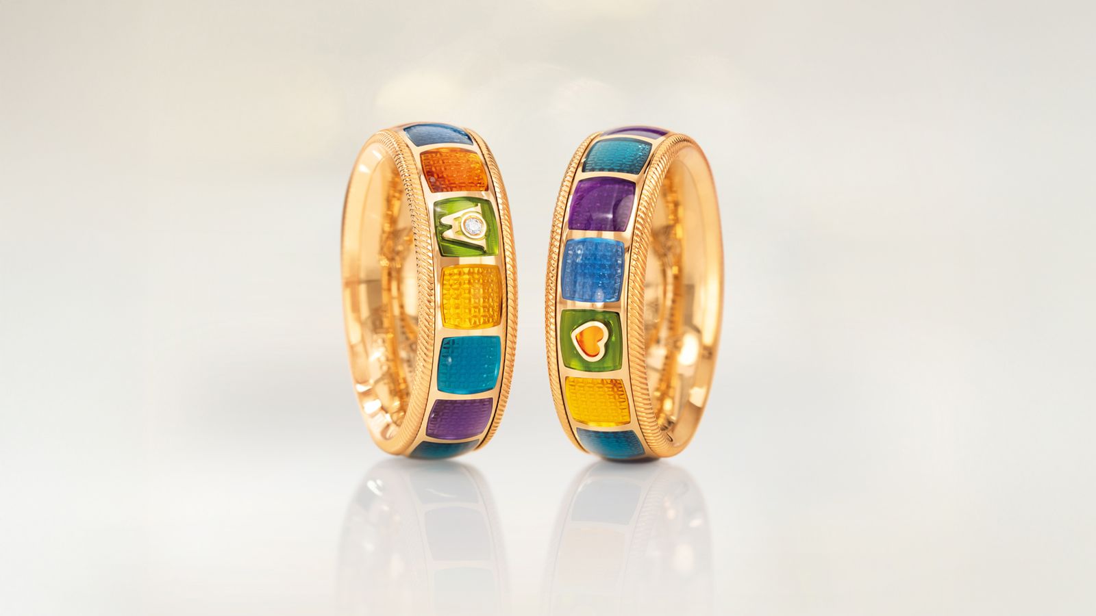 Der limitierte Geburtstagsring MEINE WELT IST BUNT: 18 Karat Gelbgold und 8 neue Farben.